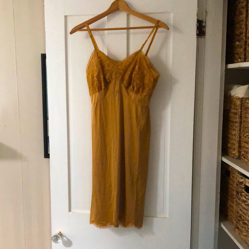 Vintage lace full slip lingerie night gown. Color is light copper/rusty gold